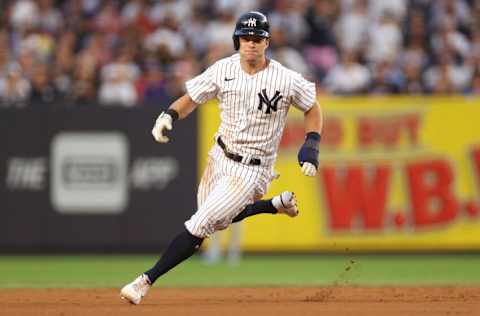 NEW YORK, NEW YORK - AUGUST 22: Andrew Benintendi #18 of the New York Yankees rounds second base on a single hit by Anthony Rizzo #48 (not pictured) during the first inning against the New York Mets at Yankee Stadium on August 22, 2022 in the Bronx borough of New York City. (Photo by Sarah Stier/Getty Images)