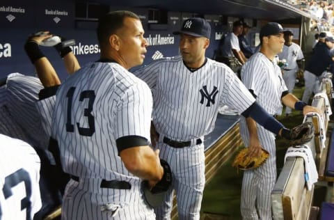 NEW YORK, NY - OCTOBER 03: (NEW YORK DAILIES OUT) Derek Jeter #2 and Alex Rodriguez #13 of the New York Yankees before the game against the Boston Red Sox at Yankee Stadium on October 3, 2012 in the Bronx borough of New York City. The Yankees defeated the Red Sox 14-2 and clinched the American League east division. (Photo by Jim McIsaac/Getty Images)