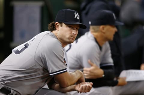 OAKLAND, CALIFORNIA - AUGUST 26: Gerrit Cole #45 of the New York Yankees looks on from the dugout O at RingCentral Coliseum on August 26, 2022 in Oakland, California. (Photo by Lachlan Cunningham/Getty Images)