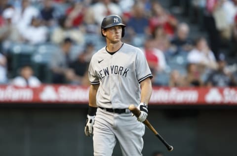 ANAHEIM, CALIFORNIA - AUGUST 29: DJ LeMahieu #26 of the New York Yankees walks to the dugout after striking out during the first inning of a game between the Los Angeles Angels and the New York Yankees at Angel Stadium of Anaheim on August 29, 2022 in Anaheim, California. (Photo by Michael Owens/Getty Images)