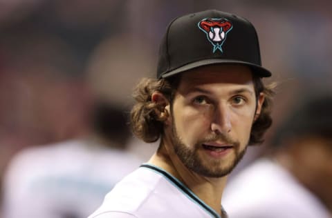 PHOENIX, ARIZONA - AUGUST 30: Pitcher Zac Gallen #23 of the Arizona Diamondbacks looks on from the dugout during the eighth inning of the MLB game against the Philadelphia Phillies at Chase Field on August 30, 2022 in Phoenix, Arizona. The Diamondbacks defeated the Phillies 12-3. (Photo by Christian Petersen/Getty Images)