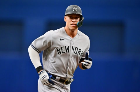 ST PETERSBURG, FLORIDA - SEPTEMBER 04: Aaron Judge #99 of the New York Yankees runs the bases after hitting a home run in the first inning against the Tampa Bay Rays at Tropicana Field on September 04, 2022 in St Petersburg, Florida. (Photo by Julio Aguilar/Getty Images)