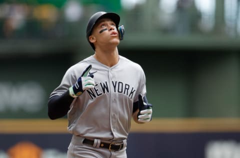 MILWAUKEE, WISCONSIN - SEPTEMBER 18: Aaron Judge #99 of the New York Yankees crosses home plate after hitting a home run in the third inning against the Milwaukee Brewers at American Family Field on September 18, 2022 in Milwaukee, Wisconsin. (Photo by John Fisher/Getty Images)