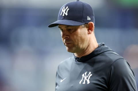 ST. PETERSBURG, FL - SEPTEMBER 3: Aaron Boone #17 of the New York Yankees returns from making a pitching change against the Tampa Bay Rays during a baseball game at Tropicana Field on September 3, 2022 in St. Petersburg, Florida. (Photo by Mike Carlson/Getty Images)