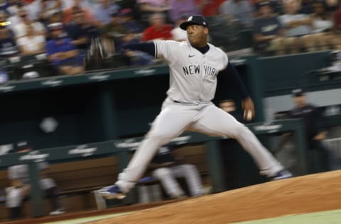 ARLINGTON, TX - OCTOBER 4: Aroldis Chapman #54 of the New York Yankees pitches against the Texas Rangers during the seventh inning in game one of a double header at Globe Life Field on October 4, 2022 in Arlington, Texas. (Photo by Ron Jenkins/Getty Images)