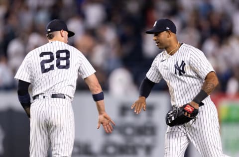 NEW YORK, NEW YORK - JUNE 28: Aaron Hicks #31 and Josh Donaldson #28 of the New York Yankees celebrate after a 2-1 victory in the game against the Oakland Athletics at Yankee Stadium on June 28, 2022 in New York City. (Photo by Dustin Satloff/Getty Images)