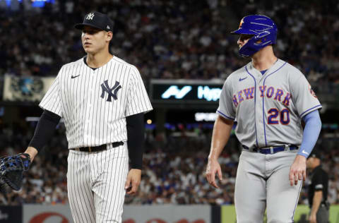 NEW YORK, NEW YORK - AUGUST 23: Pete Alonso #20 of the New York Mets in action against Anthony Rizzo #48 of the New York Yankees at Yankee Stadium on August 23, 2022 in New York City. The Yankees defeated the Mets 4-2. (Photo by Jim McIsaac/Getty Images)