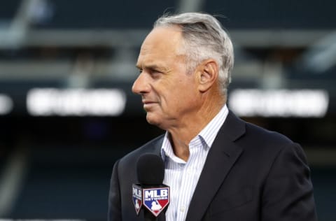 NEW YORK, NEW YORK - SEPTEMBER 15: MLB Commissioner Rob Manfred attends Roberto Clemente Day at Citi Field before a game between the New York Mets and the Pittsburgh Pirates on September 15, 2022 in New York City. Players are wearing number 21 in honor of Roberto Clemente Day. The Mets defeated the Pirates 7-1. (Photo by Jim McIsaac/Getty Images)