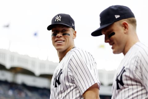 Aaron Judge #99 talks with Harrison Bader #22 of the New York Yankees (Photo by Sarah Stier/Getty Images)