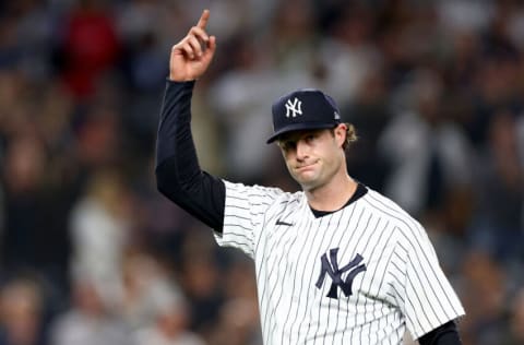 NEW YORK, NEW YORK - OCTOBER 11: Gerrit Cole #45 of the New York Yankees celebrates closing out the top of the sixth inning against the Cleveland Guardians in game one of the American League Division Series at Yankee Stadium on October 11, 2022 in New York, New York. (Photo by Elsa/Getty Images)