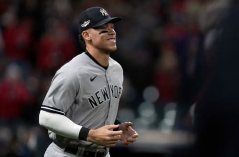 CLEVELAND, OHIO - OCTOBER 15: Aaron Judge #99 of the New York Yankees runs onto the field before the start of the game against the Cleveland Guardians in game three of the American League Division Series at Progressive Field on October 15, 2022 in Cleveland, Ohio. (Photo by Dylan Buell/Getty Images)