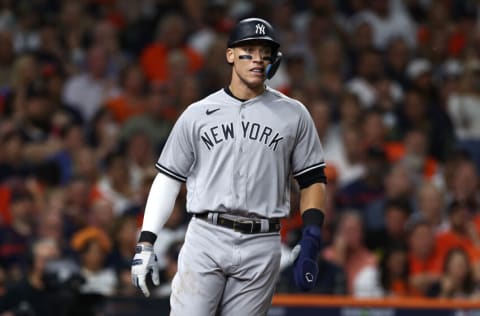 HOUSTON, TEXAS - OCTOBER 20: Aaron Judge #99 of the New York Yankees reacts after scoring a run against the Houston Astros during the fourth inning in game two of the American League Championship Series at Minute Maid Park on October 20, 2022 in Houston, Texas. (Photo by Tom Pennington/Getty Images)