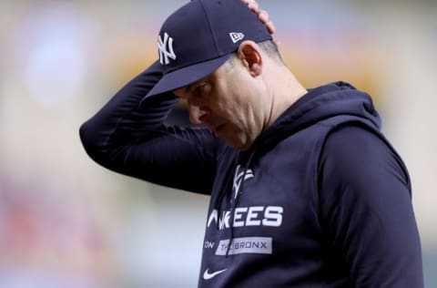 HOUSTON, TEXAS - OCTOBER 20: Manager Aaron Boone #17 of the New York Yankees reacts against the Houston Astros during the eighth inning in game two of the American League Championship Series at Minute Maid Park on October 20, 2022 in Houston, Texas. (Photo by Carmen Mandato/Getty Images)