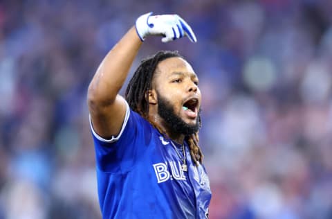 TORONTO, ON - SEPTEMBER 26: Vladimir Guerrero Jr. #27 of the Toronto Blue Jays celebrates his walk-off RBI single in the 10th inning for a 3-2 win against the New York Yankees at Rogers Centre on September 26, 2022 in Toronto, Ontario, Canada. (Photo by Vaughn Ridley/Getty Images)