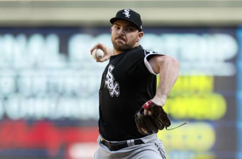 MINNEAPOLIS, MN - SEPTEMBER 29: Liam Hendriks #31 of the Chicago White Sox delivers a pitch against the Minnesota Twins in the ninth inning of the game at Target Field on September 29, 2022 in Minneapolis, Minnesota. The White Sox defeated the Twins 4-3. (Photo by David Berding/Getty Images)