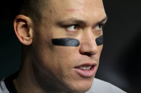 HOUSTON, TEXAS - OCTOBER 20: Aaron Judge #99 of the New York Yankees looks on from the dugout against the Houston Astros during the sixth inning in game two of the American League Championship Series at Minute Maid Park on October 20, 2022 in Houston, Texas. (Photo by Carmen Mandato/Getty Images)