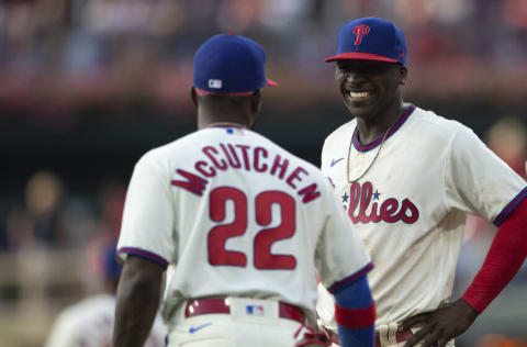 PHILADELPHIA, PA - JULY 16: Didi Gregorius #18 of the Philadelphia Phillies talks to Andrew McCutchen #22 against the Miami Marlins during Game Two of the doubleheader at Citizens Bank Park on July 16, 2021 in Philadelphia, Pennsylvania. The Marlins defeated the Phillies 7-0. (Photo by Mitchell Leff/Getty Images)