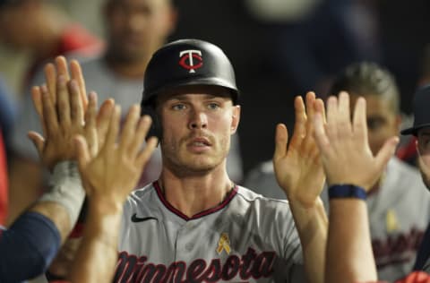 CHICAGO, ILLINOIS - SEPTEMBER 02: Max Kepler #26 of the Minnesota Twins is congratulated by teammates after scoring against the Chicago White Sox at Guaranteed Rate Field on September 02, 2022 in Chicago, Illinois. (Photo by Nuccio DiNuzzo/Getty Images)