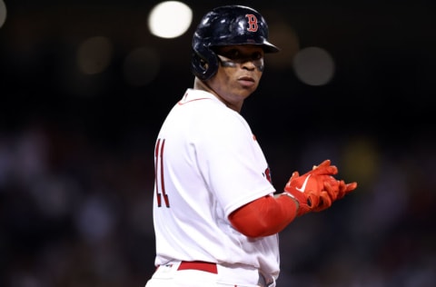 BOSTON, MASSACHUSETTS - SEPTEMBER 14: Rafael Devers #11 of the Boston Red Sox looks on after hitting a single during the eighth inning against the New York Yankees at Fenway Park on September 14, 2022 in Boston, Massachusetts. (Photo by Maddie Meyer/Getty Images)