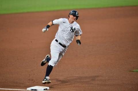 Oct 7, 2020; San Diego, California, USA; New York Yankees second baseman DJ LeMahieu (26) runs home to score on a double by center fielder Aaron Hicks (not pictured) against the Tampa Bay Rays in the fifth inning during game three of the 2020 ALDS at Petco Park. Mandatory Credit: Gary A. Vasquez-USA TODAY Sports