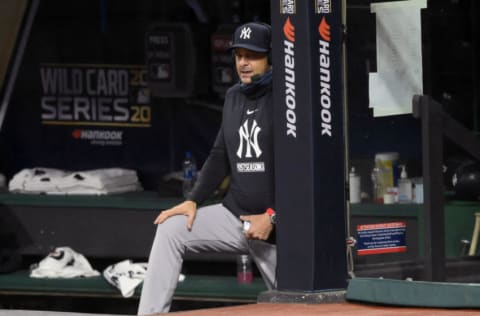 Sep 29, 2020; Cleveland, Ohio, USA; New York Yankees manager Aaron Boone stands in the dugout in the fourth inning against the Cleveland Indians at Progressive Field. Mandatory Credit: David Richard-USA TODAY Sports