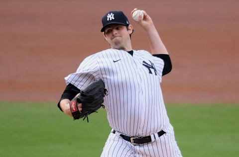 Oct 8, 2020; San Diego, California, USA; New York Yankees starting pitcher Jordan Montgomery (47) throws against the Tampa Bay Rays during the first inning of game four of the 2020 ALDS at Petco Park. Mandatory Credit: Orlando Ramirez-USA TODAY Sports