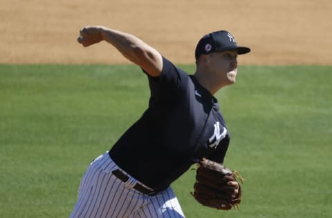 Feb 24, 2021; Tampa, Florida, USA; New York Yankees starting pitcher Jameson Taillon (50) throws a pitch during live batting practice during spring training workouts at George M. Steinbrenner Field. Mandatory Credit: Kim Klement-USA TODAY Sports