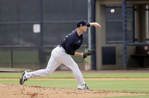 Feb 25, 2021; Tampa, Florida, USA; New York Yankees pitcher Lucas Luetge (63) throws a pitch during live batting practice during spring training at the Yankees player development complex. Mandatory Credit: Kim Klement-USA TODAY Sports