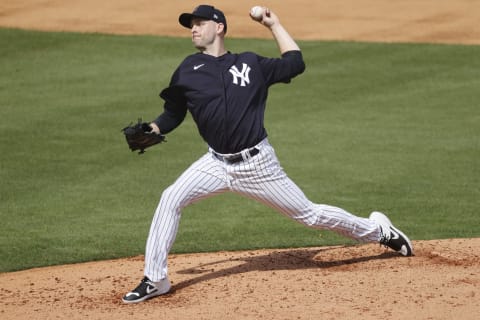 Feb 25, 2021; Tampa, Florida, USA; New York Yankees pitcher Lucas Luetge (63) throws a pitch during a simulated game at George M. Steinbrenner Field. Mandatory Credit: Kim Klement-USA TODAY Sports