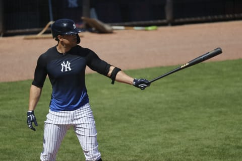 Feb 25, 2021; Tampa, Florida, USA; New York Yankees designated hitter Giancarlo Stanton (27) at bat during a simulated game at George M. Steinbrenner Field. Mandatory Credit: Kim Klement-USA TODAY Sports