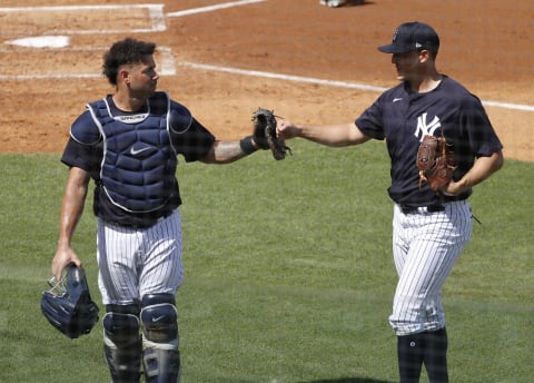 Mar 1, 2021; Tampa, Florida, USA; New York Yankees starting pitcher Jameson Taillon (50) is congratulated by catcher Gary Sanchez (24) after he pitched the second inning against the Detroit Tigers at George M. Steinbrenner Field. Mandatory Credit: Kim Klement-USA TODAY Sports