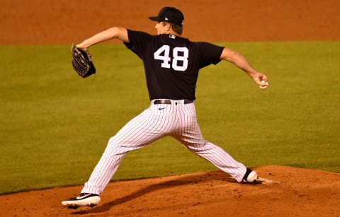 Mar 3, 2021; Tampa, Florida, USA; New York Yankees pitcher Adam Warren (48) throws a pitch in the third inning against the Toronto Blue Jays during a spring training game at George M. Steinbrenner Field. Mandatory Credit: Jonathan Dyer-USA TODAY Sports