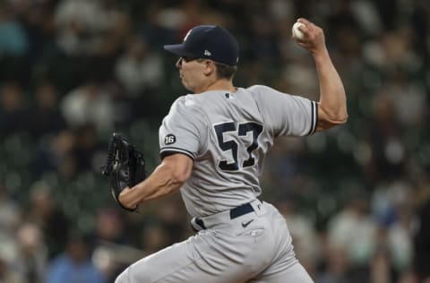 Jul 7, 2021; Seattle, Washington, USA; Seattle Mariners reliever Chad Green (57) delivers a pitch during the ninth inning of a game against the Seattle Mariners at T-Mobile Park. The Yankees won 5-4. Mandatory Credit: Stephen Brashear-USA TODAY Sports