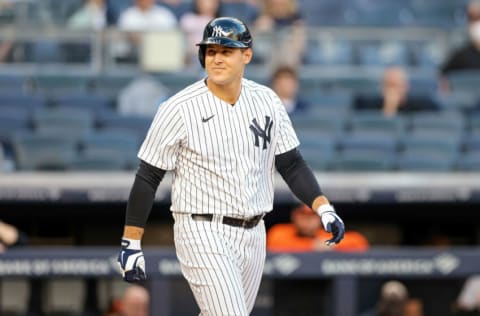 Aug 2, 2021; Bronx, New York, USA; New York Yankees first baseman Anthony Rizzo (48) reacts after being hit by a pitch during the first inning against the Baltimore Orioles at Yankee Stadium. Mandatory Credit: Vincent Carchietta-USA TODAY Sports