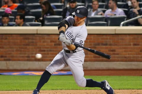 Sep 10, 2021; New York City, New York, USA; New York Yankees center fielder Brett Gardner (11) triples against the New York Mets during the first inning at Citi Field. Mandatory Credit: Andy Marlin-USA TODAY Sports