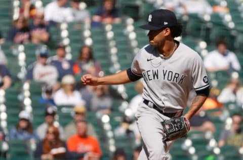 May 29, 2021; Detroit, Michigan, USA; New York Yankees starting pitcher Deivi Garcia (84) pitches during the second inning against the Detroit Tigers at Comerica Park. Mandatory Credit: Rick Osentoski-USA TODAY Sports