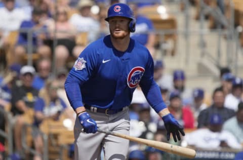 Mar 20, 2022; Phoenix, Arizona, USA; Chicago Cubs DH Clint Frazier (77) reacts after walking against the Los Angeles Dodgers in the first inning during a spring training game at Camelback Ranch-Glendale. Mandatory Credit: Rick Scuteri-USA TODAY Sports