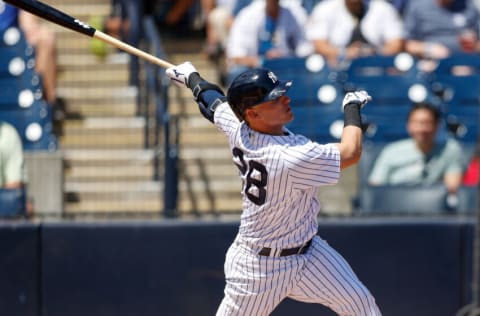 Mar 27, 2022; Tampa, Florida, USA; New York Yankees third baseman Josh Donaldson (28) hits a home run in the first inning against the Pittsburgh Pirates during spring training at George M. Steinbrenner Field. Mandatory Credit: Nathan Ray Seebeck-USA TODAY Sports