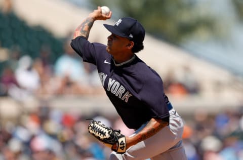 Mar 28, 2022; Lakeland, Florida, USA; New York Yankees starting pitcher Deivi Garcia (83) throws a pitch in the first inning against the Detroit Tigers during spring training at Publix Field at Joker Marchant Stadium. Mandatory Credit: Nathan Ray Seebeck-USA TODAY Sports