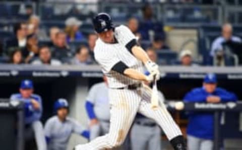 May 23, 2017; Bronx, NY, USA; New York Yankees third baseman Chase Headley (12) doubles against the Kansas City Royals during the sixth inning at Yankee Stadium. Mandatory Credit: Andy Marlin-USA TODAY Sports