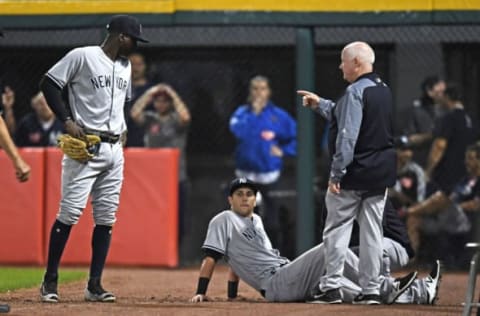 Jun 29, 2017; Chicago, IL, USA; New York Yankees right fielder Dustin Fowler (34) lays on the ground after colliding with the wall in the first inning against the Chicago White Sox at Guaranteed Rate Field. Mandatory Credit: Patrick Gorski-USA TODAY Sports