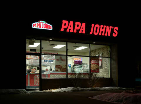 The front exterior of a Papa John's restaurant