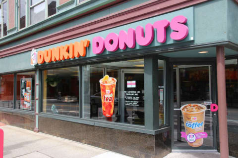 The front exterior of a Dunkin' Donuts restaurant