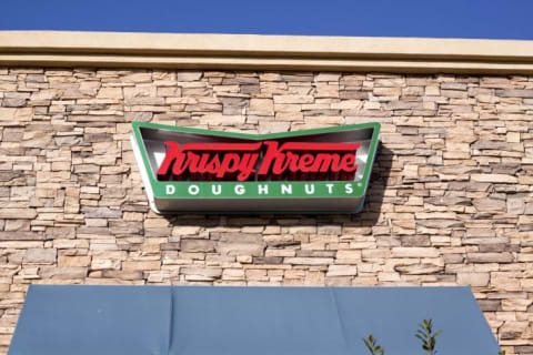 The front exterior of a Krispy Kreme restaurant