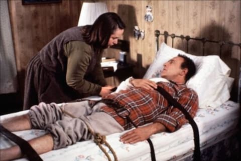 Kathy Bates and James Caan star in Misery (1990).