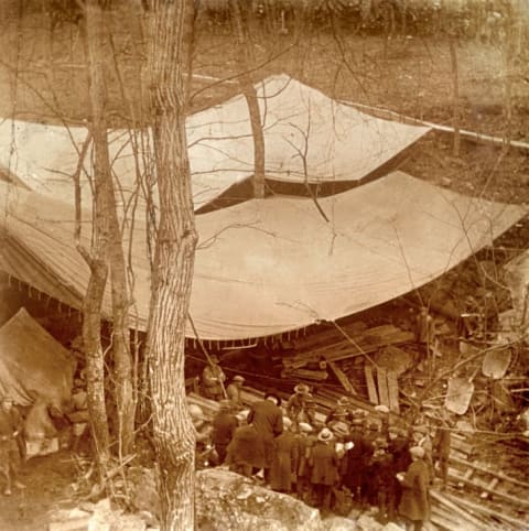 Tarps were placed over the shaft to protect it from the rain.