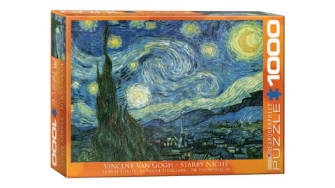 A puzzle box with a reproduction of 'Starry Night' on the cover