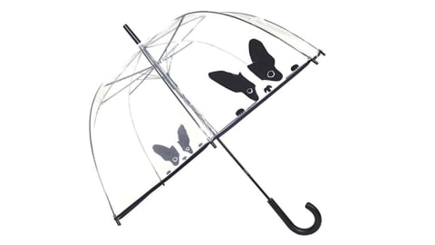 A clear umbrella with a black-and-white design of two French bulldogs on it