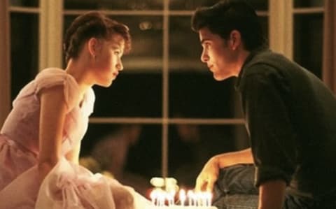 Molly Ringwald and Michael Schoeffling in Sixteen Candles (1984).