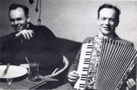 Dr. Stasiek Matulewicz and Dr. Eugene Lazowski (playing accordion).